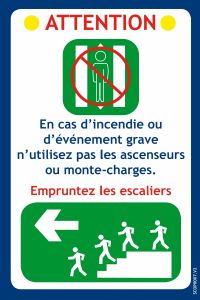 Consigne "empruntez les escaliers" gauche